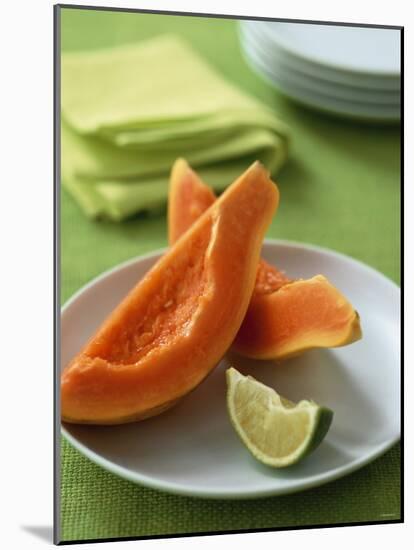 Two Papaya Wedges on a Plate-Michael Paul-Mounted Photographic Print