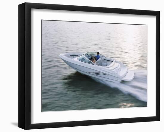 Two People in a Motorboat-null-Framed Premium Photographic Print