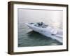 Two People in a Motorboat-null-Framed Photographic Print