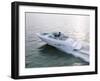 Two People in a Motorboat-null-Framed Photographic Print