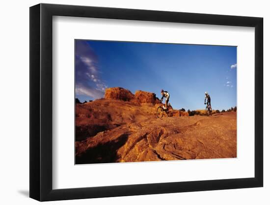 Two people mountain biking, Moab, Utah, USA-Richard Sisk-Framed Photographic Print