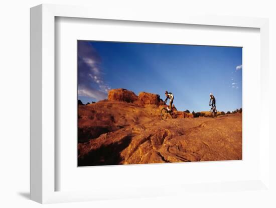 Two people mountain biking, Moab, Utah, USA-Richard Sisk-Framed Photographic Print