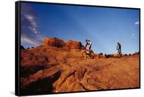 Two people mountain biking, Moab, Utah, USA-Richard Sisk-Framed Stretched Canvas