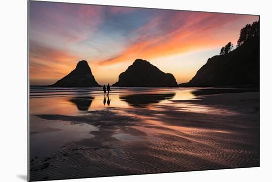 Two people silhouetted at sunset with Seastack and headland at sunset, from Devil's Elbow State Par-Adam Jones-Mounted Photographic Print