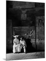Two People Sitting in Hospital Where St. Catherine Nursed People with the Plague-Walter Sanders-Mounted Photographic Print
