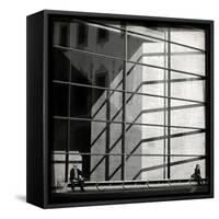 Two People Sitting Outside a Modern Glass Building-Eudald Castells-Framed Stretched Canvas