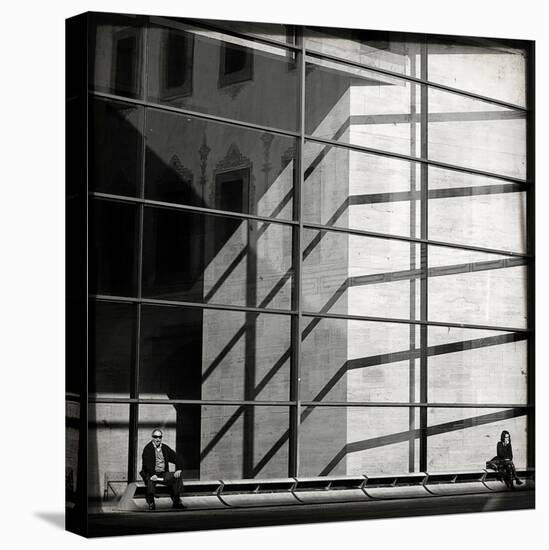 Two People Sitting Outside a Modern Glass Building-Eudald Castells-Stretched Canvas