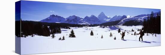 Two People Skiing, Mt Assiniboine, Mt Assiniboine Provincial Park, British Columbia, Canada-null-Stretched Canvas