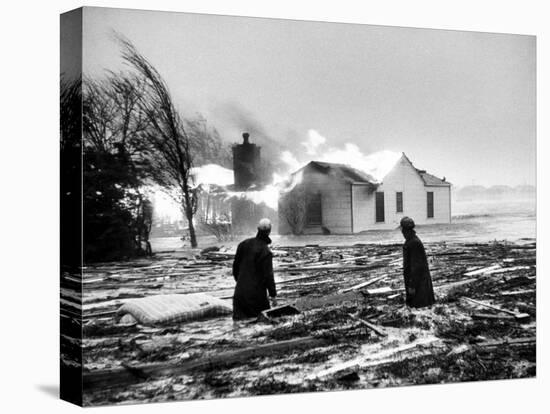 Two People Watching House Burn in Aftermath of Hurricane Hazel-Hank Walker-Stretched Canvas