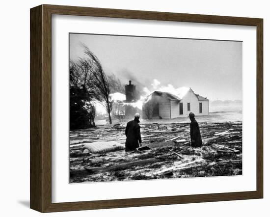 Two People Watching House Burn in Aftermath of Hurricane Hazel-Hank Walker-Framed Photographic Print