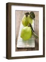 Two Quinces with Leaves on Tea Towel-Eising Studio - Food Photo and Video-Framed Photographic Print