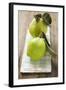 Two Quinces with Leaves on Tea Towel-Eising Studio - Food Photo and Video-Framed Photographic Print