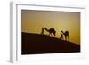 Two Rabari men climbing a dune with their dromedaries at sunset, Great Rann of Kutch Desert, India-G&M Therin-Weise-Framed Photographic Print