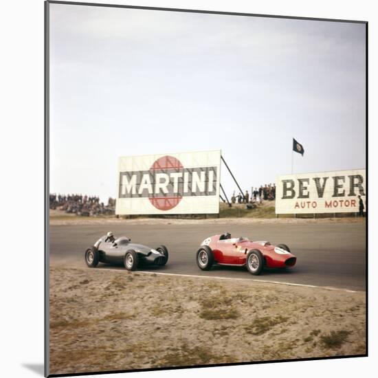 Two Racing Cars Taking a Bend, Dutch Grand Prix, Zandvoort, Holland, 1959-null-Mounted Photographic Print