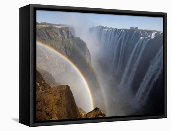 Two Rainbows Rest in Between Zimbabwe and Zambia Seen from the Zambian Side of Victoria Falls.-Karine Aigner-Framed Stretched Canvas