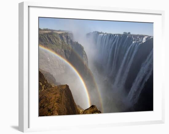 Two Rainbows Rest in Between Zimbabwe and Zambia Seen from the Zambian Side of Victoria Falls.-Karine Aigner-Framed Photographic Print