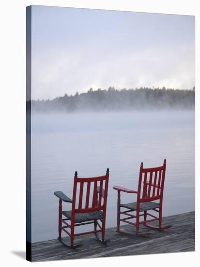 Two Red Rockers on Dock at Sunrise, Lake Mooselookmegontic, Maine-Nance Trueworthy-Stretched Canvas