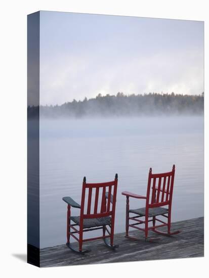 Two Red Rockers on Dock at Sunrise, Lake Mooselookmegontic, Maine-Nance Trueworthy-Stretched Canvas