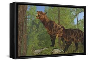 Two Saber-Toothed Cats Search for Prey in a Pine Forest-null-Framed Stretched Canvas