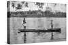 Two Seminole Indians Pole a Canoe on the Miami River, C.1895-null-Stretched Canvas