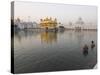 Two Sikh Pilgrims Bathing and Praying in the Early Morning in Holy Pool, Amritsar, India-Eitan Simanor-Stretched Canvas