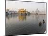 Two Sikh Pilgrims Bathing and Praying in the Early Morning in Holy Pool, Amritsar, India-Eitan Simanor-Mounted Photographic Print