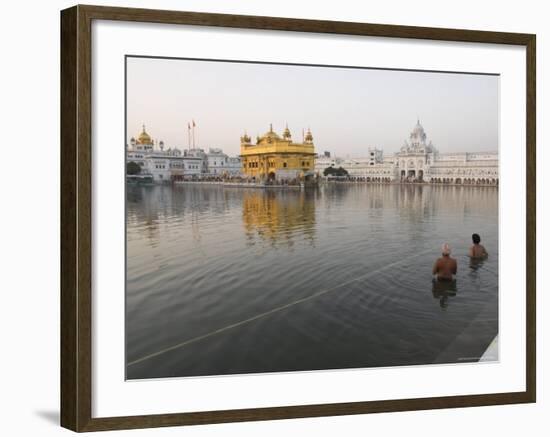 Two Sikh Pilgrims Bathing and Praying in the Early Morning in Holy Pool, Amritsar, India-Eitan Simanor-Framed Photographic Print