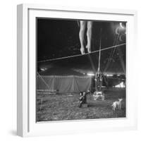 Two Small Children Watching Circus Performer Practicing on Tightrope, Her Legs Only Visible-Nina Leen-Framed Photographic Print