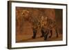 Two Smilodon Cats Find Protection in a Vast Cave System-null-Framed Art Print