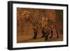 Two Smilodon Cats Find Protection in a Vast Cave System-null-Framed Art Print