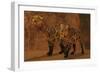 Two Smilodon Cats Find Protection in a Vast Cave System-null-Framed Art Print