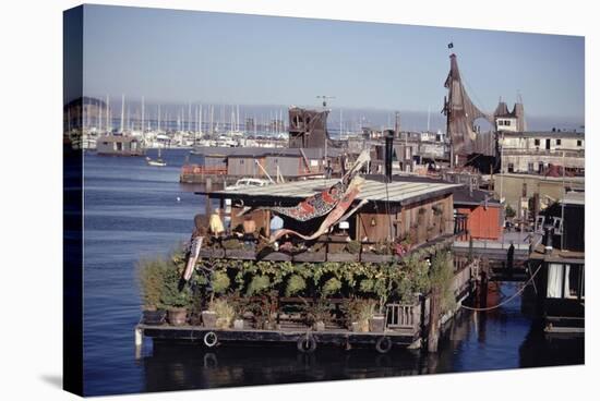 Two-Story Floating Home Covered in Hanging and Potted Plants, Sausalito, CA, 1971-Michael Rougier-Stretched Canvas