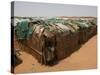 Two Sudanese Boys Stand by Makeshift Huts-null-Stretched Canvas