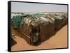 Two Sudanese Boys Stand by Makeshift Huts-null-Framed Stretched Canvas