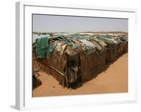 Two Sudanese Boys Stand by Makeshift Huts-null-Framed Photographic Print