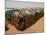 Two Sudanese Boys Stand by Makeshift Huts-null-Mounted Photographic Print