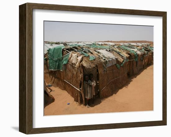 Two Sudanese Boys Stand by Makeshift Huts-null-Framed Photographic Print