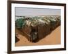 Two Sudanese Boys Stand by Makeshift Huts-null-Framed Photographic Print