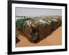 Two Sudanese Boys Stand by Makeshift Huts-null-Framed Photographic Print