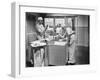 Two Surgeons and a Nurse in the Scrub Room Preparing for an Operation-null-Framed Photo