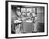 Two Surgeons and a Nurse in the Scrub Room Preparing for an Operation-null-Framed Photo