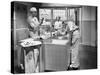 Two Surgeons and a Nurse in the Scrub Room Preparing for an Operation-null-Stretched Canvas