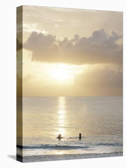 Two Swimmers in Ocean at Sunset, Grace Bay, Providenciales, Turks and Caicos, West Indies-Kim Walker-Stretched Canvas