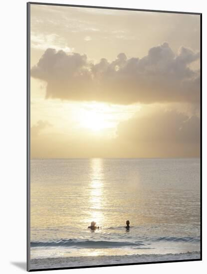 Two Swimmers in Ocean at Sunset, Grace Bay, Providenciales, Turks and Caicos, West Indies-Kim Walker-Mounted Photographic Print