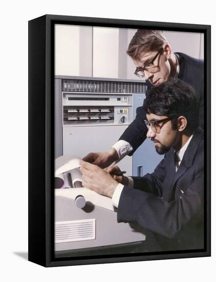 Two Technicians Check a Computer Printout-Heinz Zinram-Framed Stretched Canvas