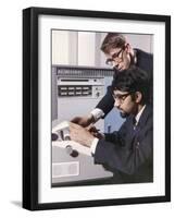 Two Technicians Check a Computer Printout-Heinz Zinram-Framed Photographic Print