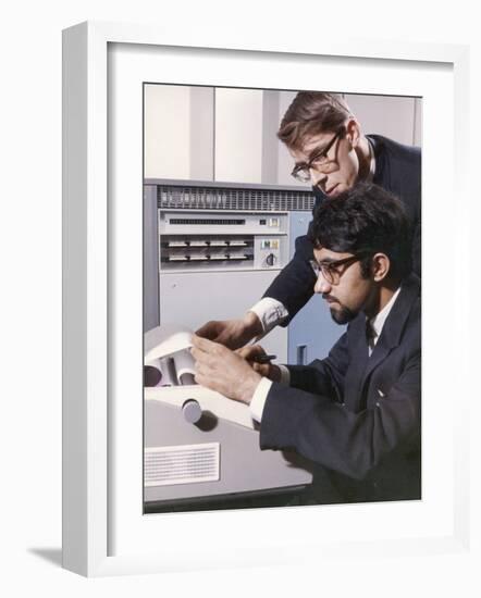 Two Technicians Check a Computer Printout-Heinz Zinram-Framed Photographic Print
