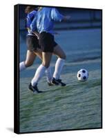 Two Teenage Girls Running for a Soccer Ball-null-Framed Stretched Canvas