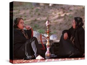 Two Unidentified Iranian Women Smoke a Water Pipe-null-Stretched Canvas