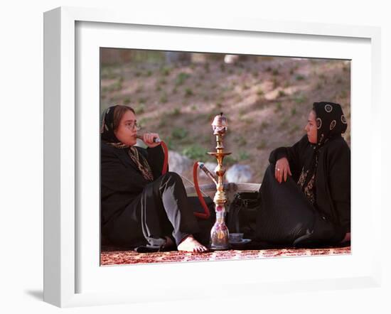 Two Unidentified Iranian Women Smoke a Water Pipe-null-Framed Photographic Print